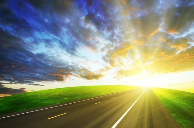 Asphalt road and beautiful sky at sunset. Nature landscape background.